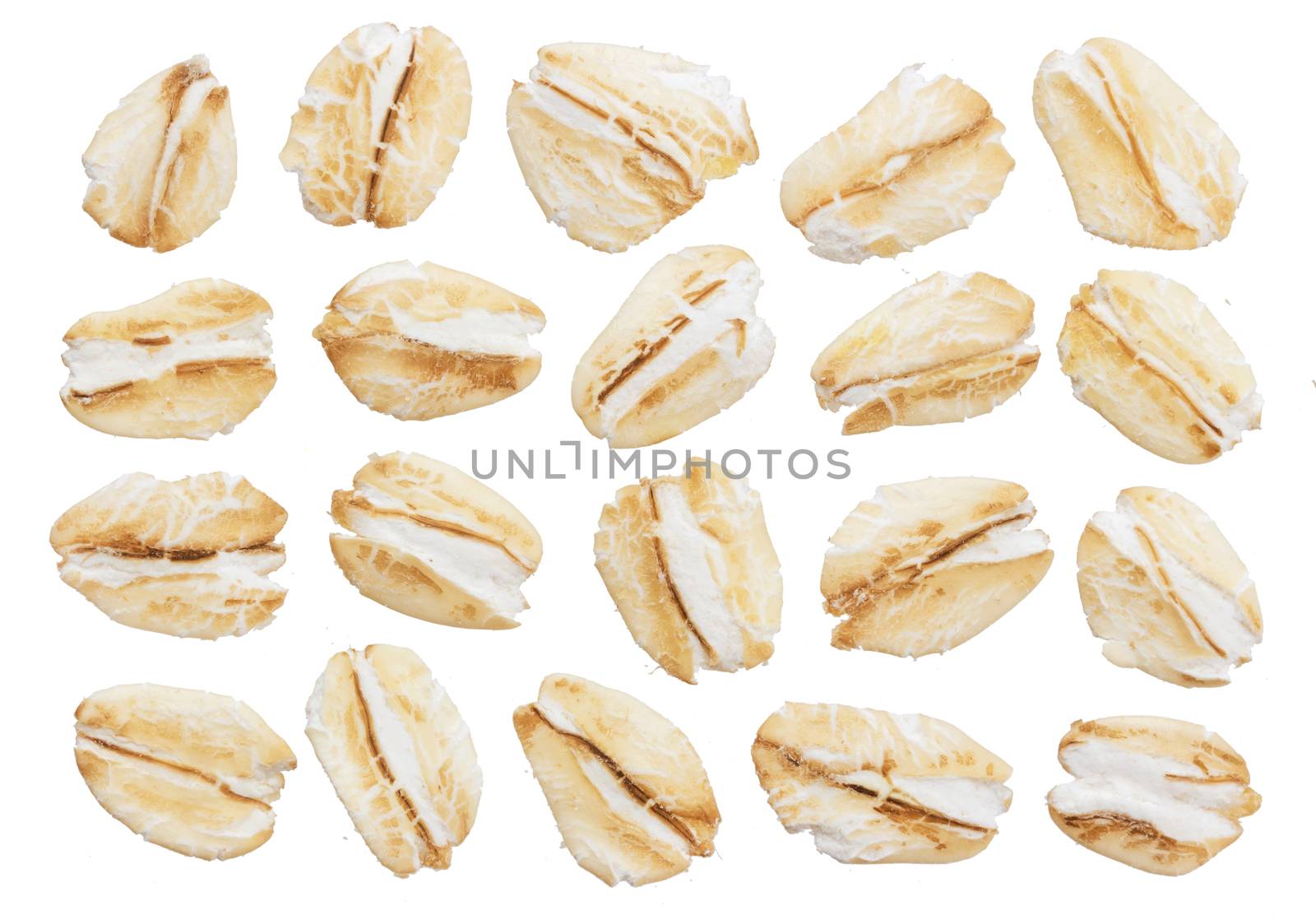 Oat flakes isolated on white background. Top view. Close up. by xamtiw