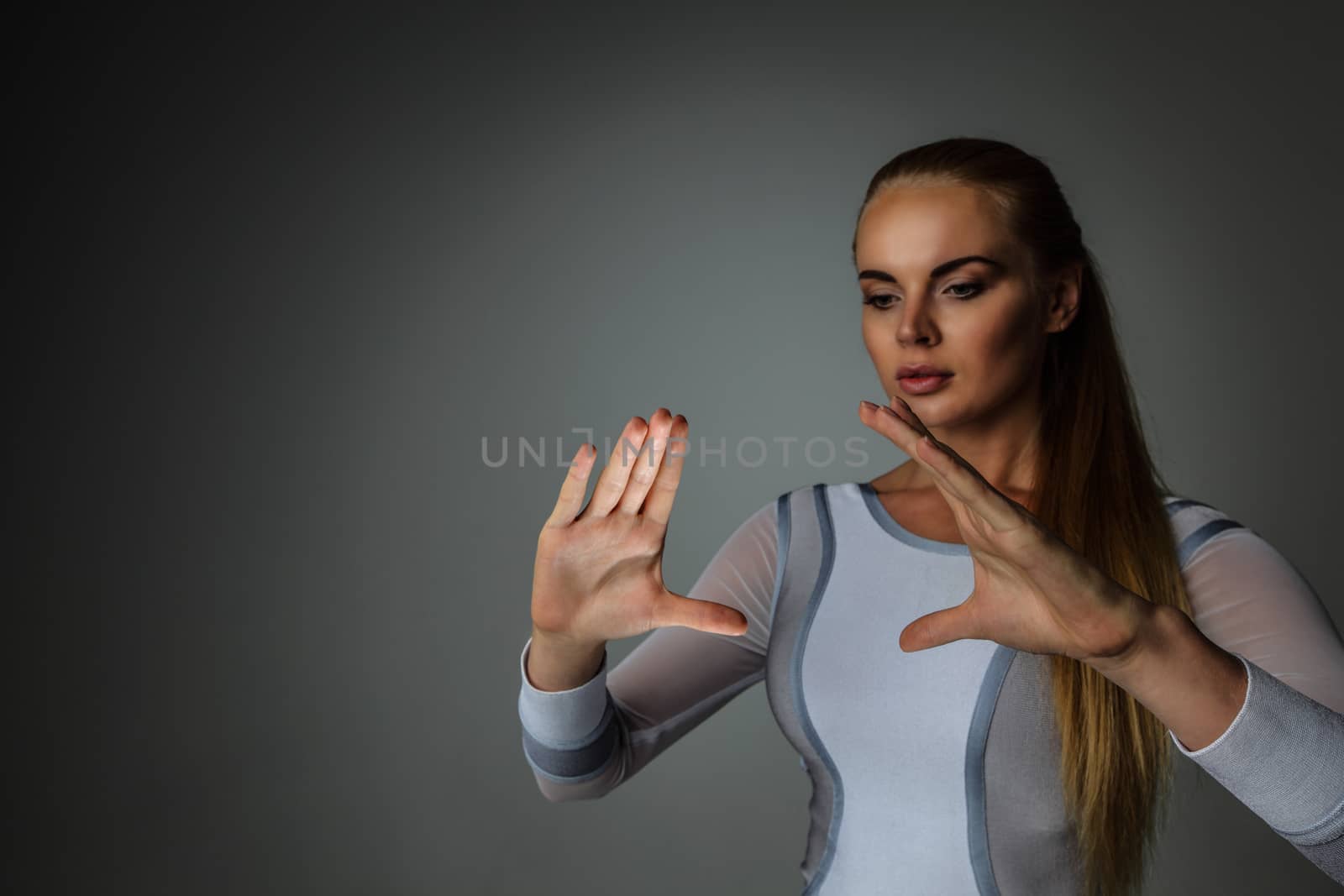 Woman holding abstract glowing object by ALotOfPeople