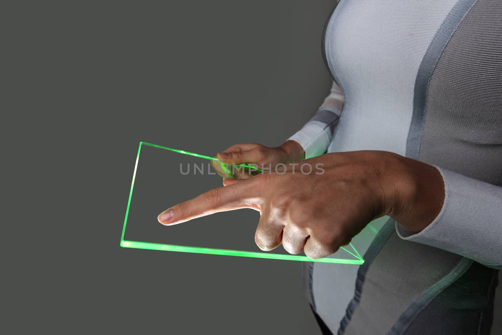 Hands holding blank futuristic transparent tablet pc by ALotOfPeople