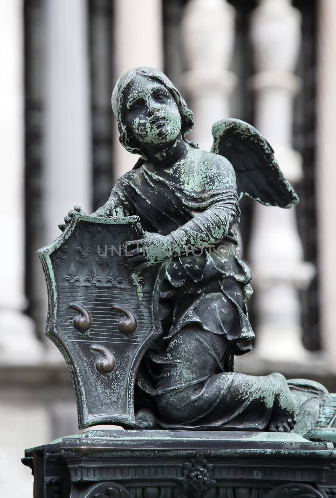 Sculpture of an angel holding coat of arms of Colleoni family, Bergamo, Italy