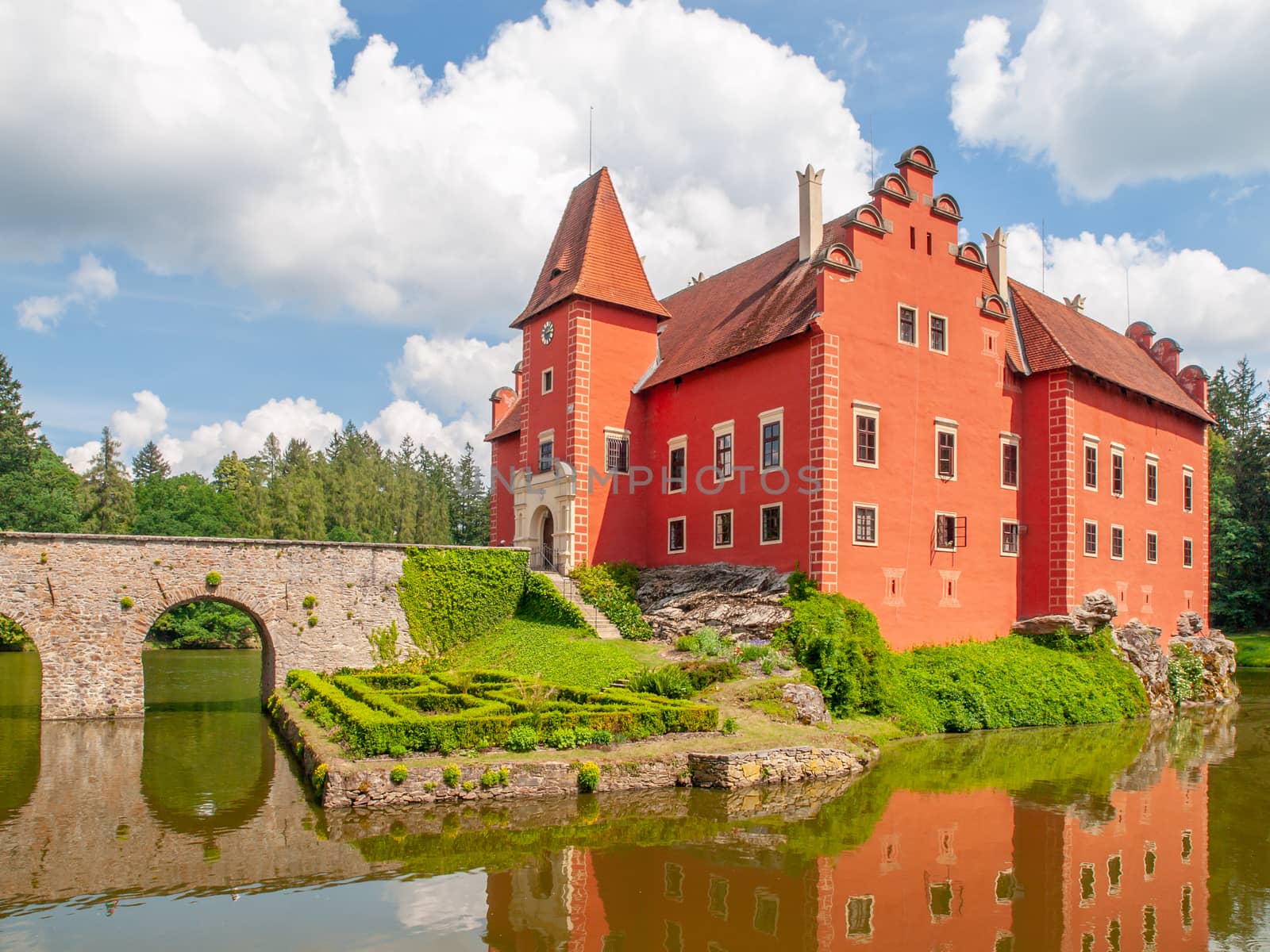 Renaissance chateau Cervena Lhota in Southern Bohemia, Czech Republic. Idyllic and picturesque fairy tale castle on the small island reflected in the romantic lake.