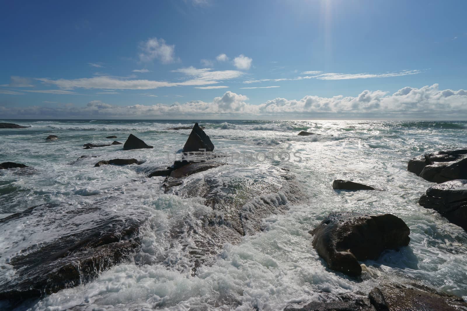 Ocean daytime landscape, giving strength. The space is filled with water, spray and ocean noise