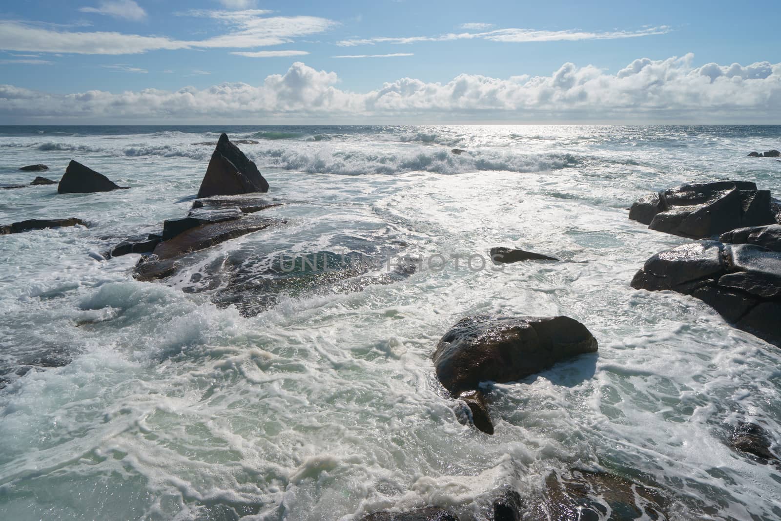 Ocean daytime landscape, giving strength. The space is filled with water, spray and ocean noise