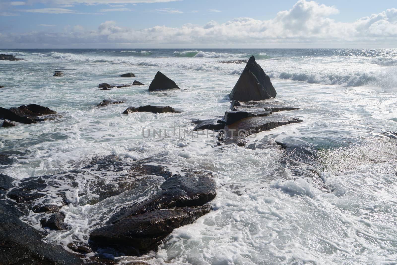 Ocean daytime landscape, giving strength. The space is filled with water, spray and ocean noise