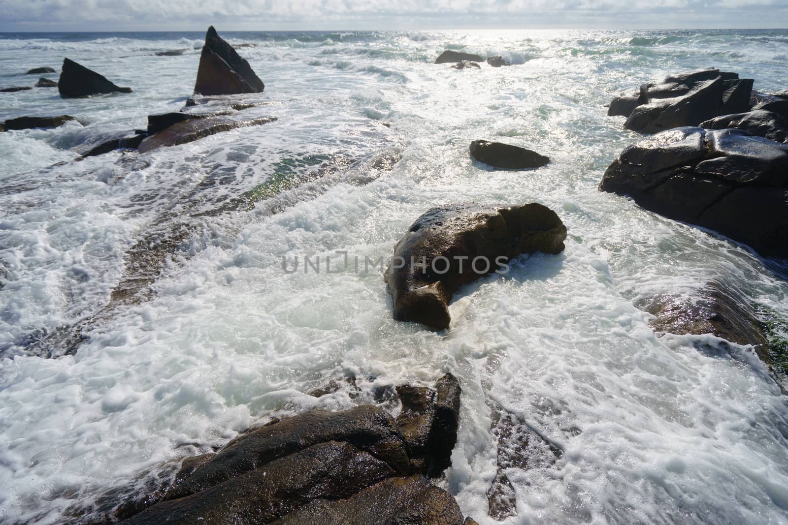 The space is filled with water, spray and ocean noise