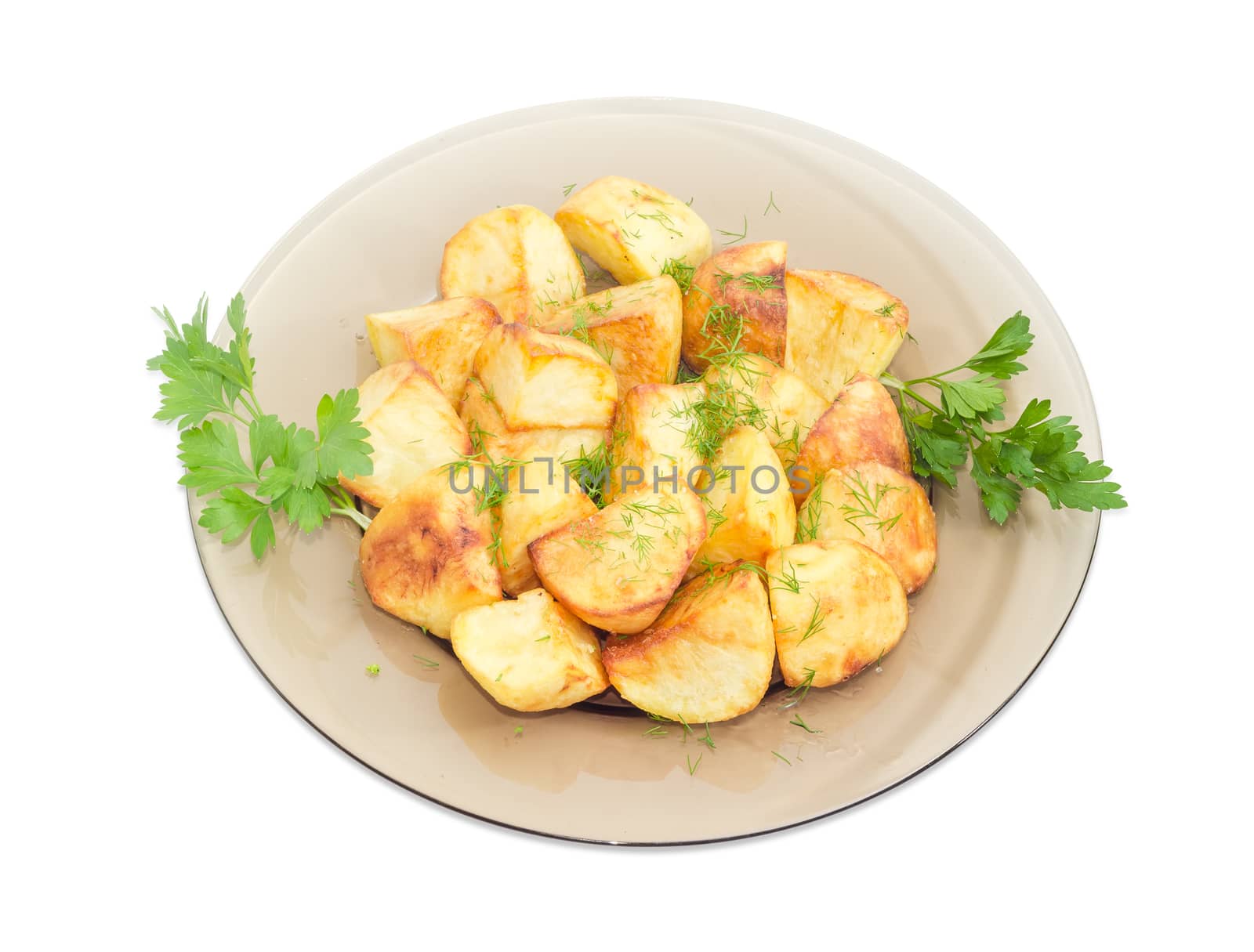 Fried potatoes with dill and parsley on dark glass dish by anmbph