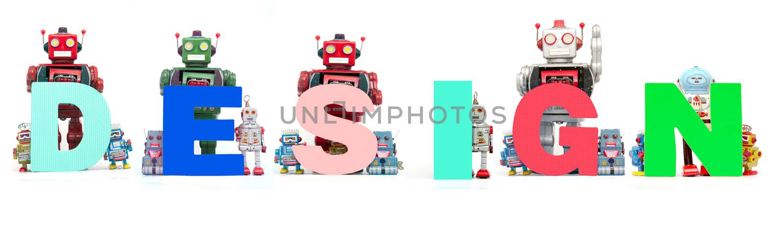 retro tin robot toys hold up the word  DEDIGN  by davincidig