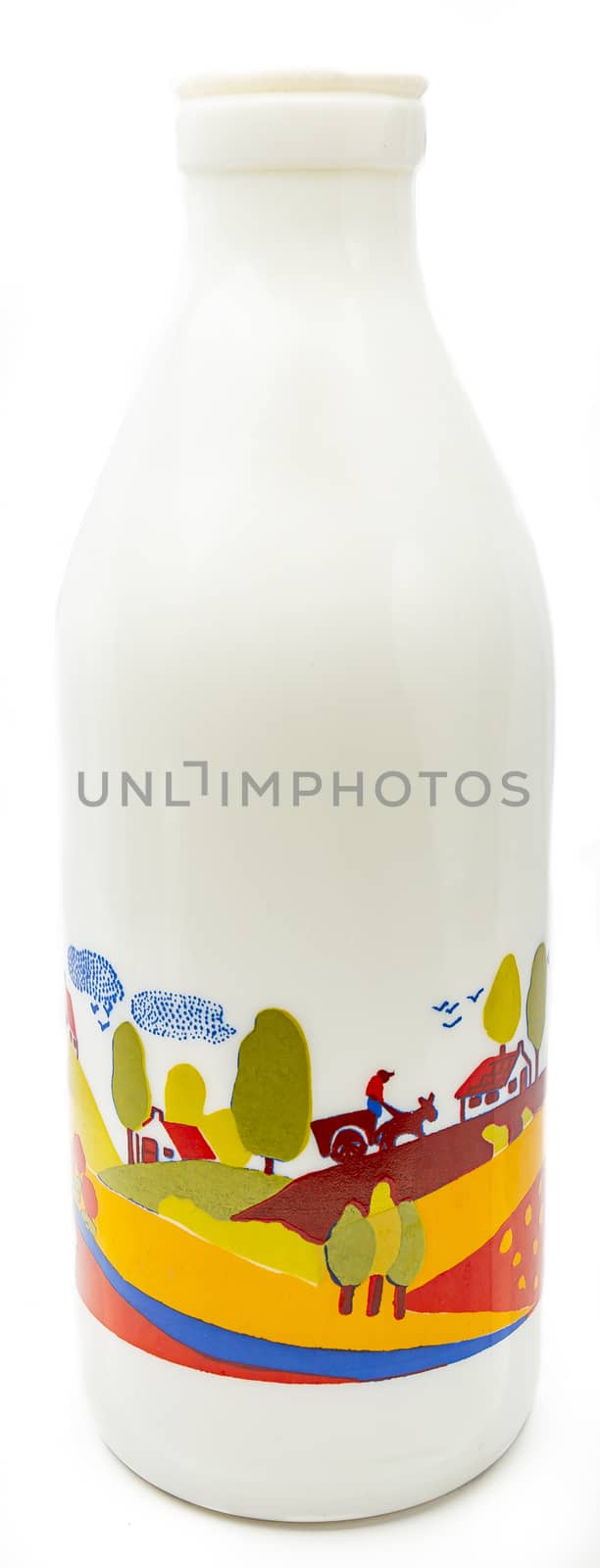 Milk bottle with country side design