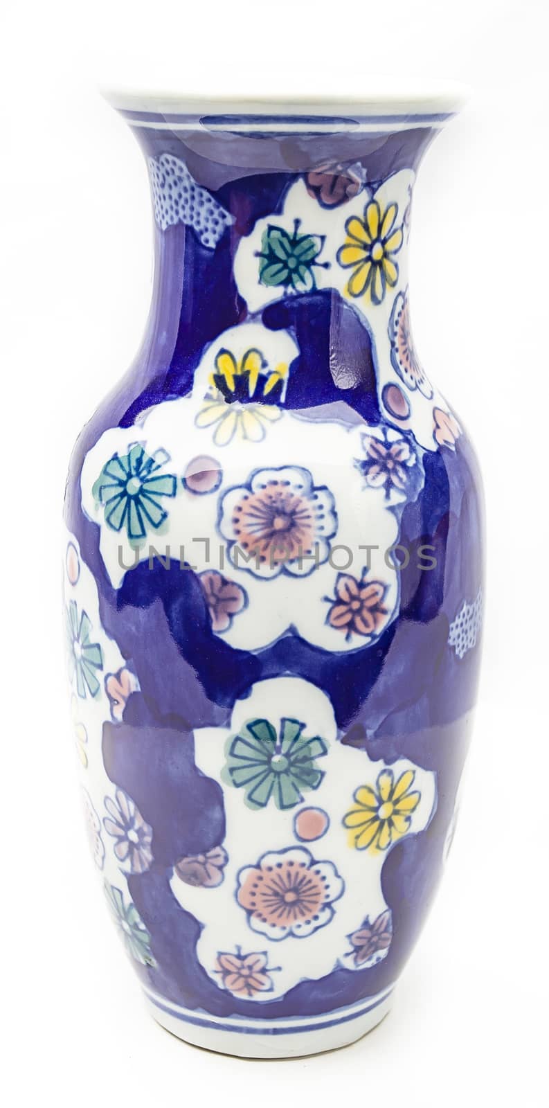 Vase painted with flower pattern againt a white background