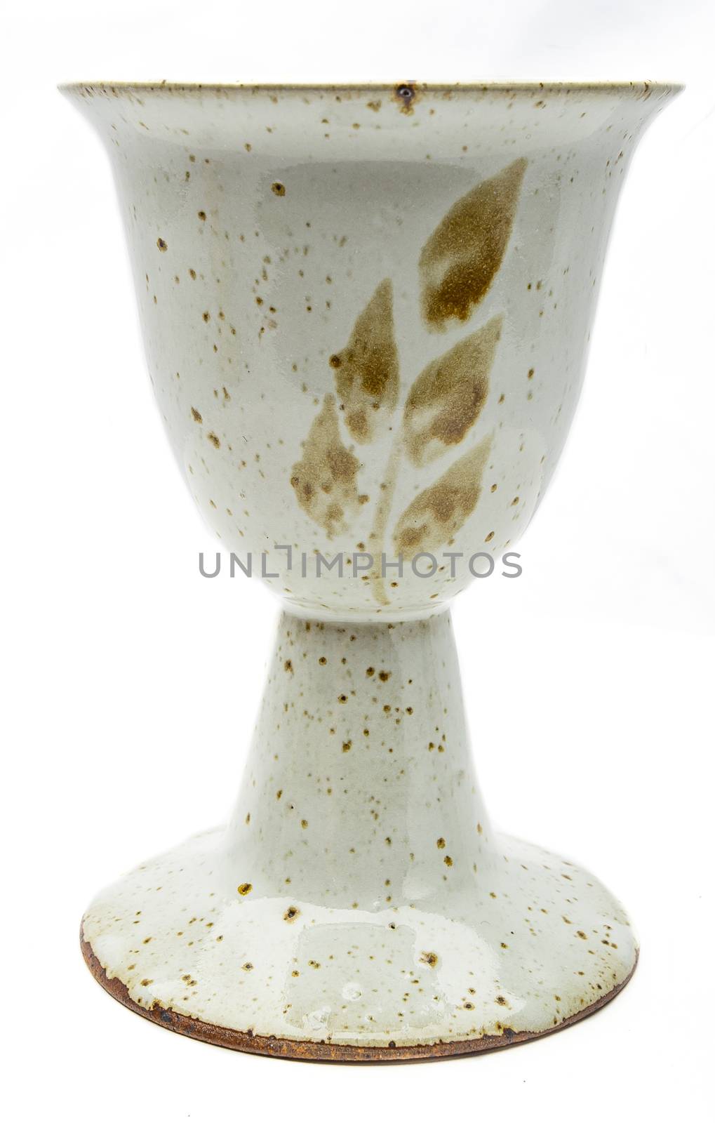Isolated wine chalice with leaf pattern
