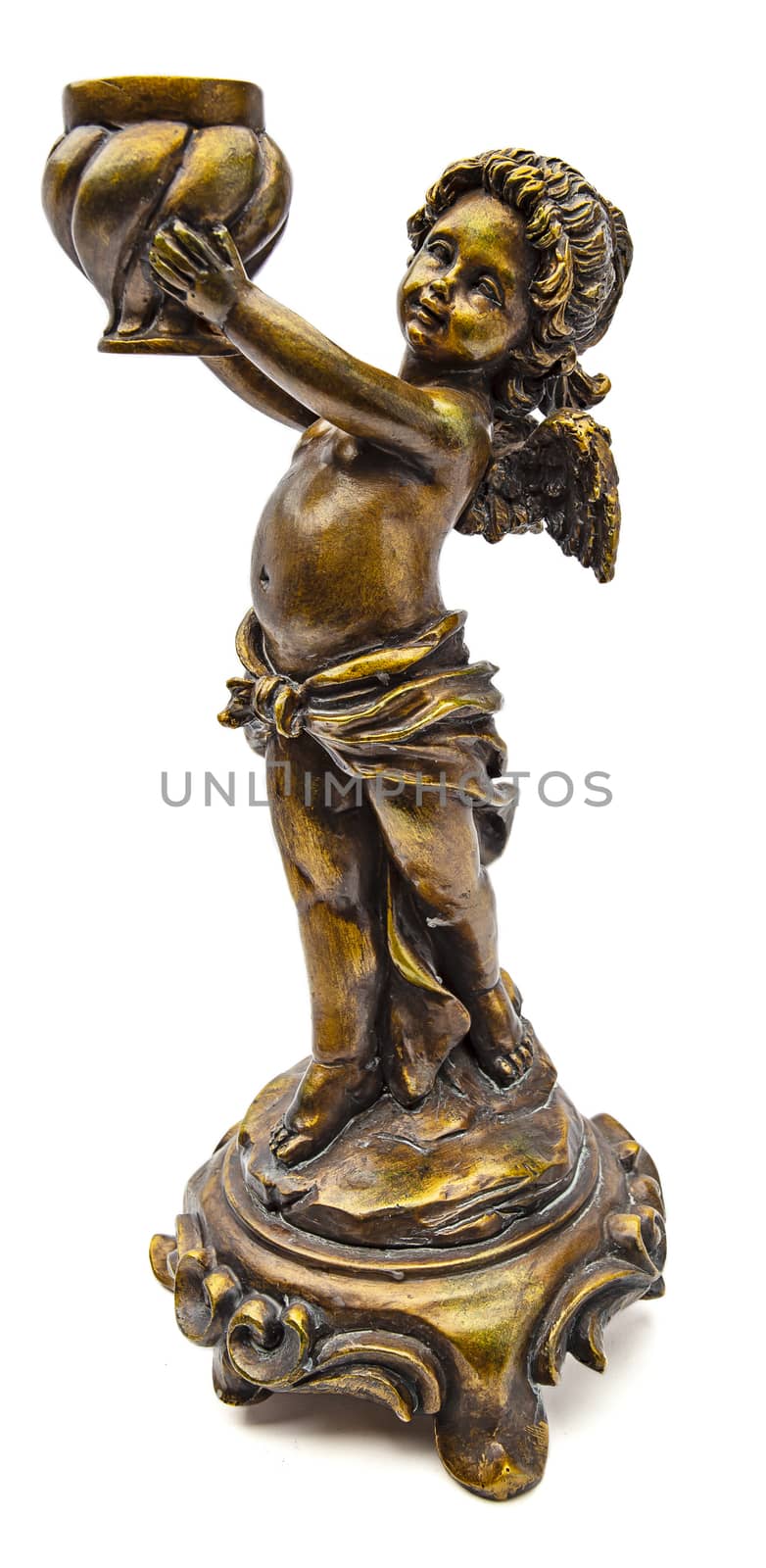 Isolated brass angel candle holder statue against a white background