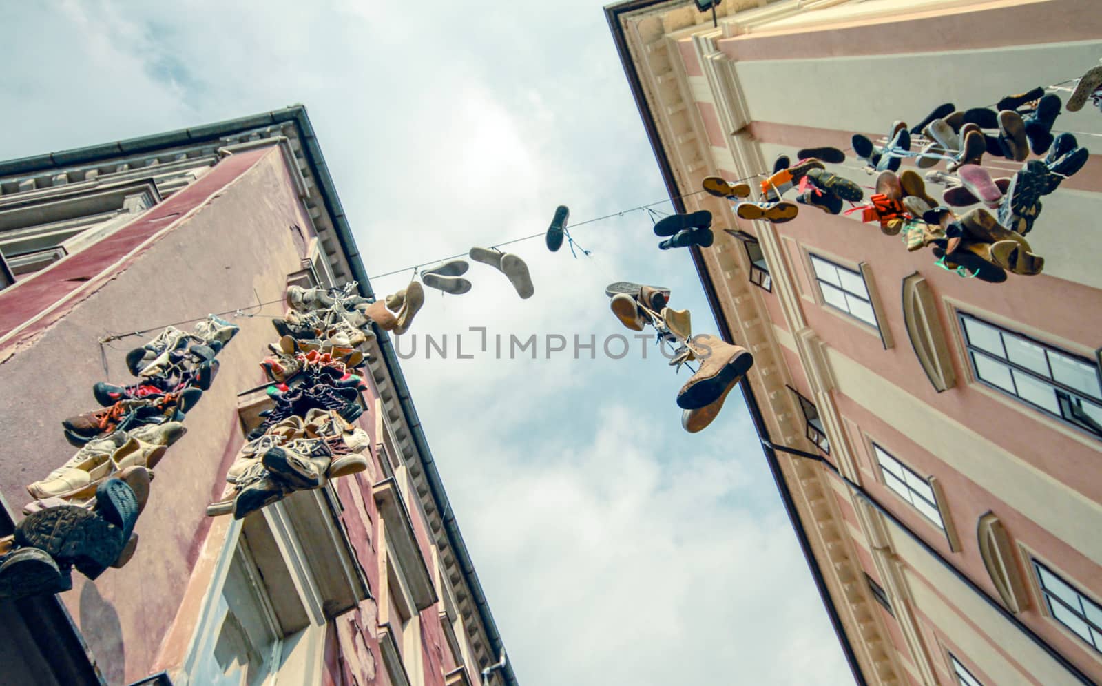 Hanging shoes urban image by davincidig