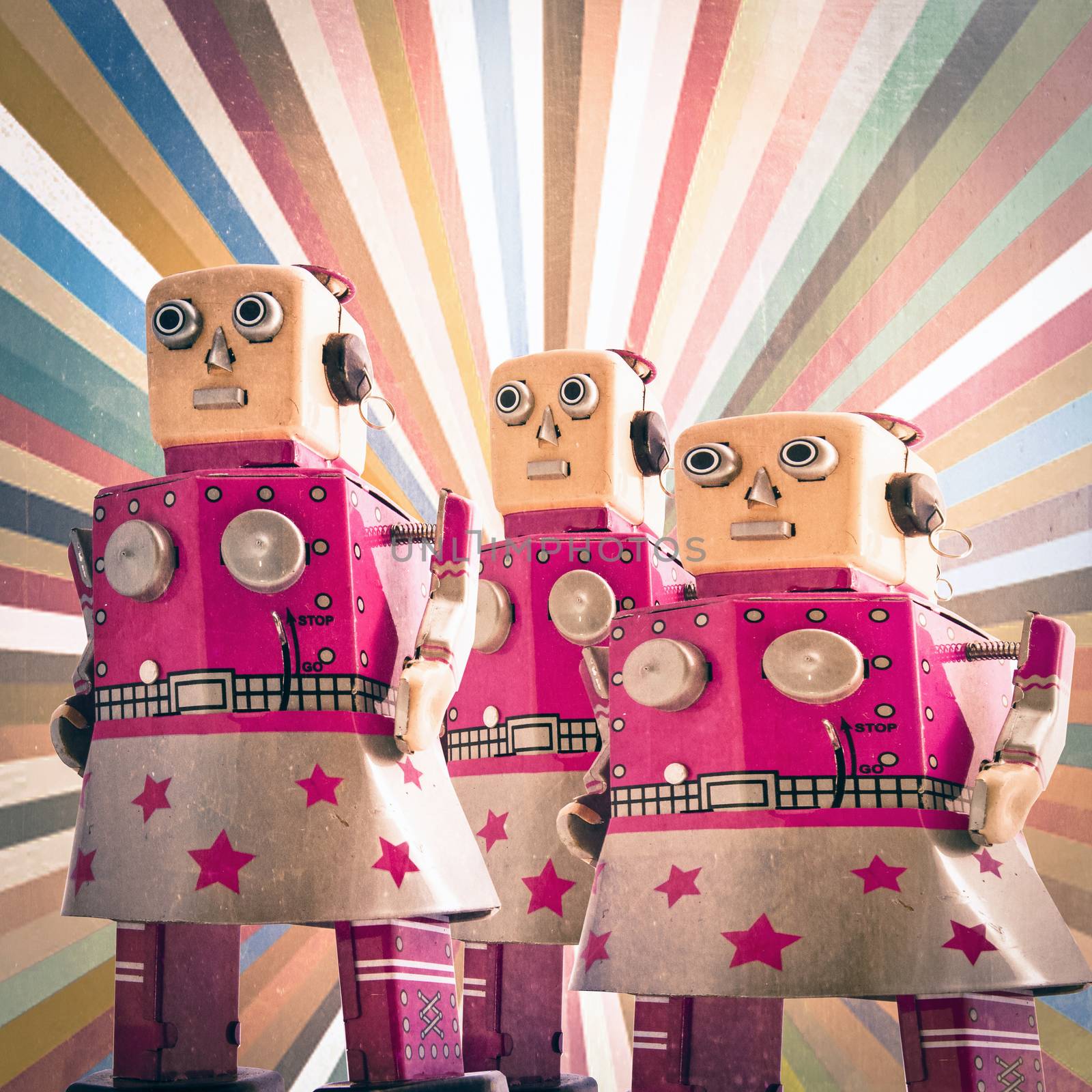 three girl robot toys looking forward, by davincidig