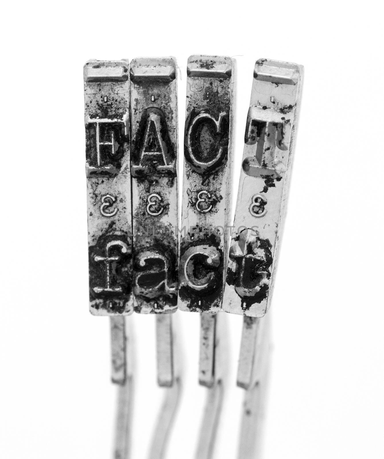 The word  FACT with old typewriter hammers by davincidig