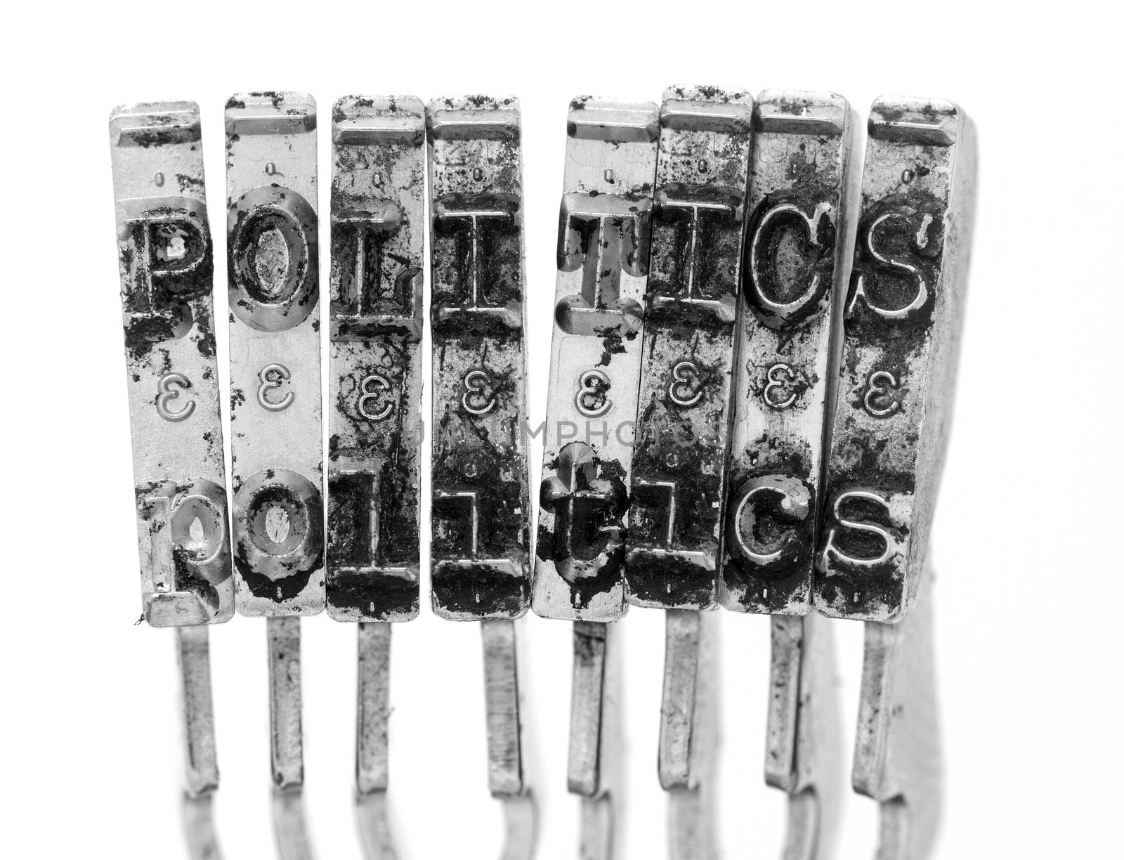 The word  POLITICS with old typewriter hammers  by davincidig