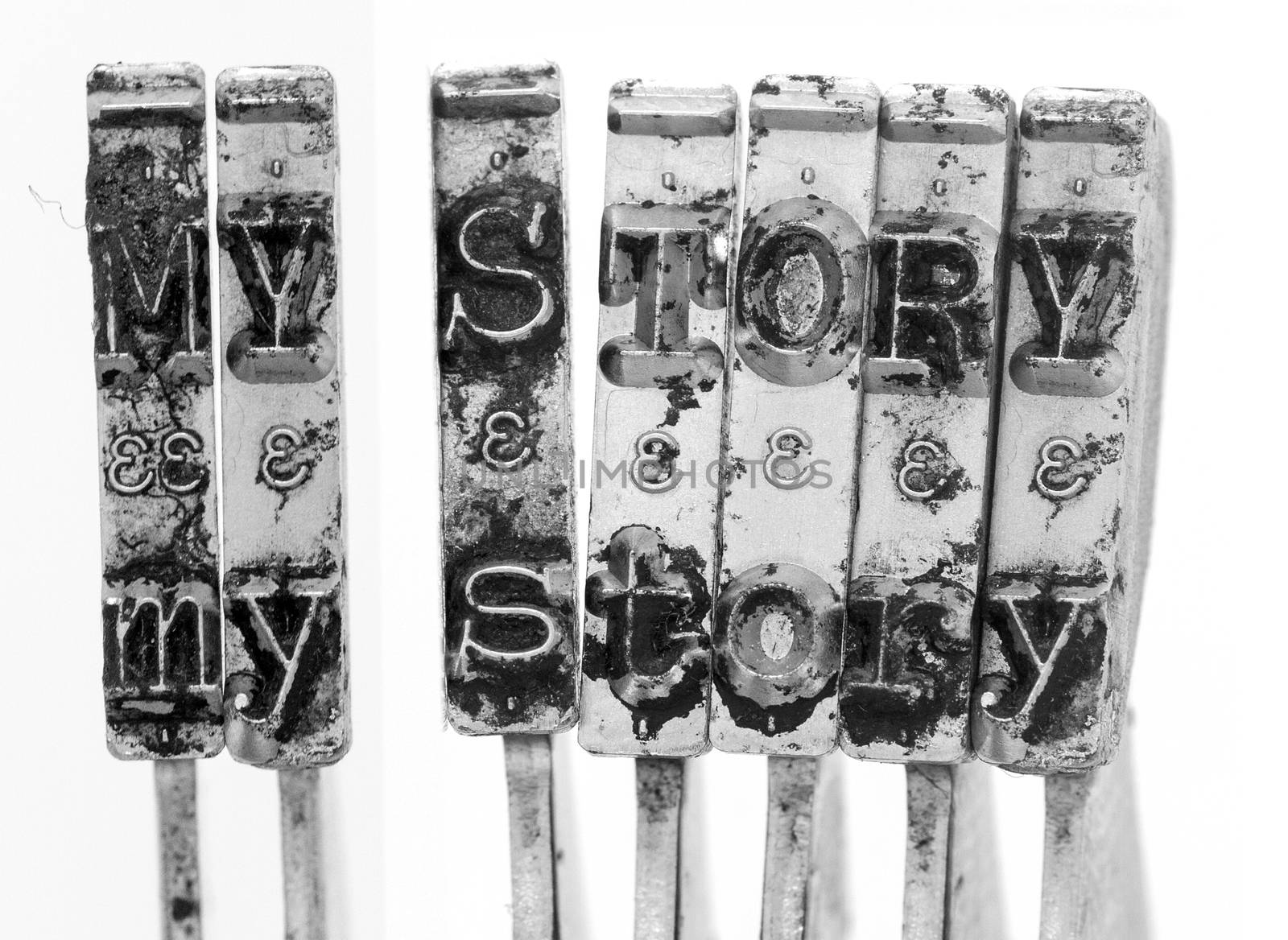 The words  MY STORY  with old typewriter hammers  by davincidig