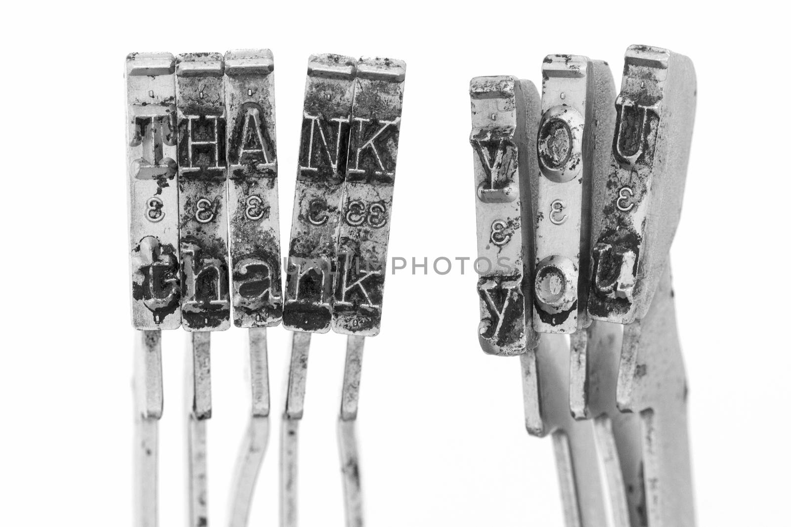 The word Thank you with old typewriter hammers macro image 