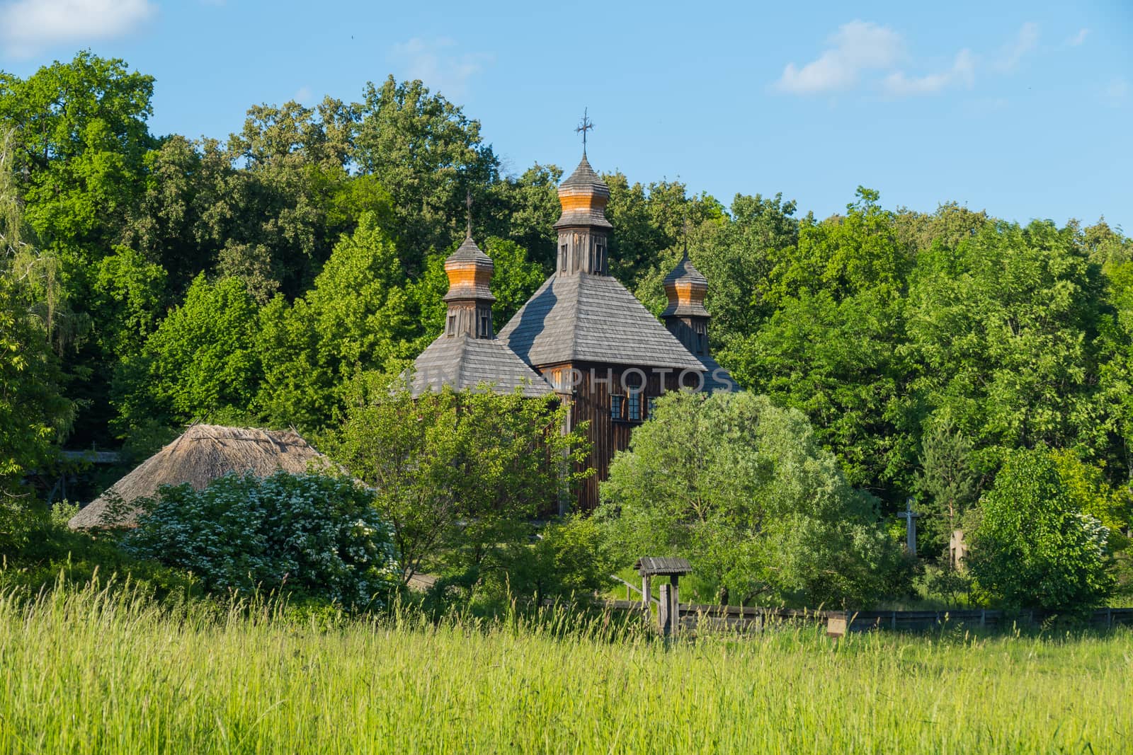 Memorial of folk wooden architecture church with domes in the museum. Uzhhorod Ukraine