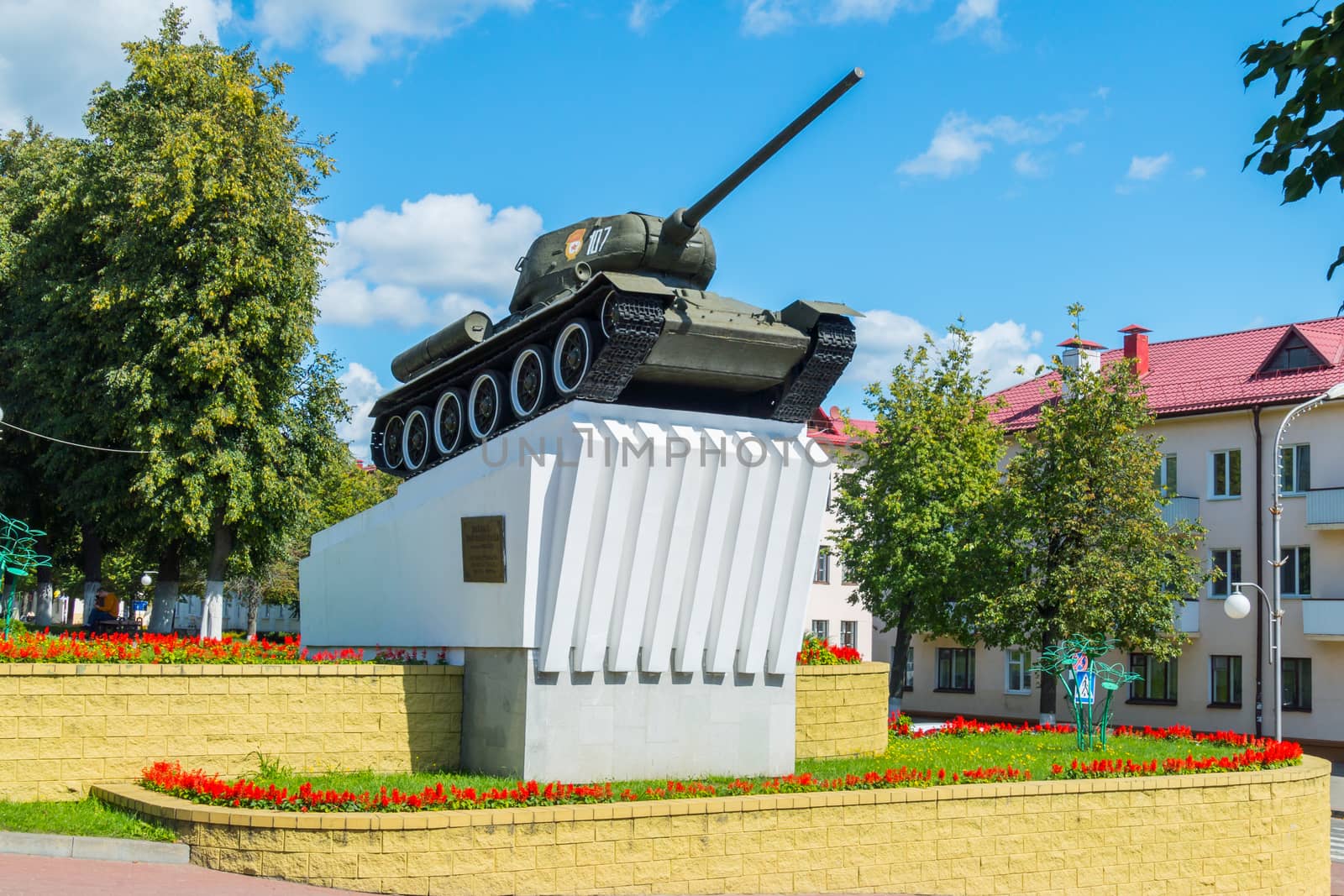 tank on a clean and well-maintained pedestal on one of the streets of the city by Adamchuk