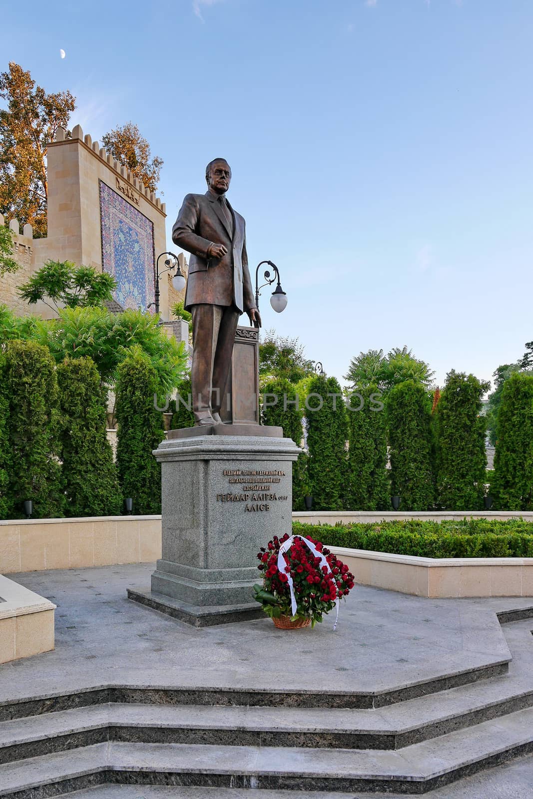 a monument to famous politician Heydar Aliyev with flowers at the foot. Kiev. Ukraine
