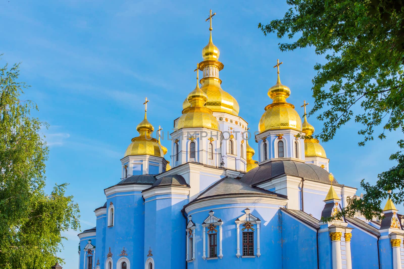 Shining in the sun temple with golden domes