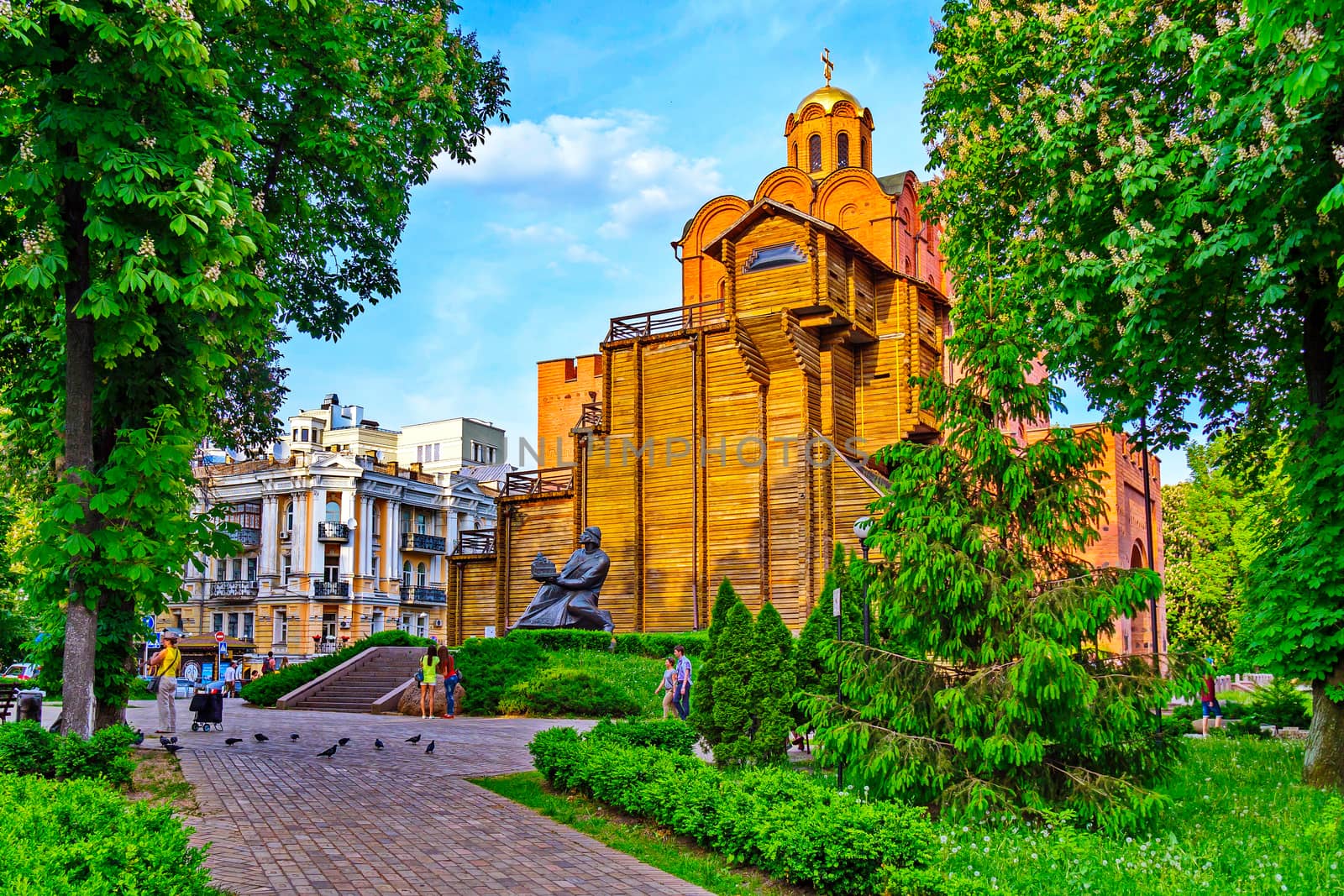 A large number of people in the park near the entrance to the Golden Gate. Kyiv, Ukrina