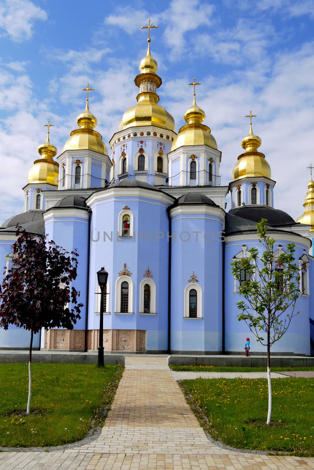 St. Michael's monastery raised its golden domes into the sky blue between the clouds. Kyiv. Ukraine