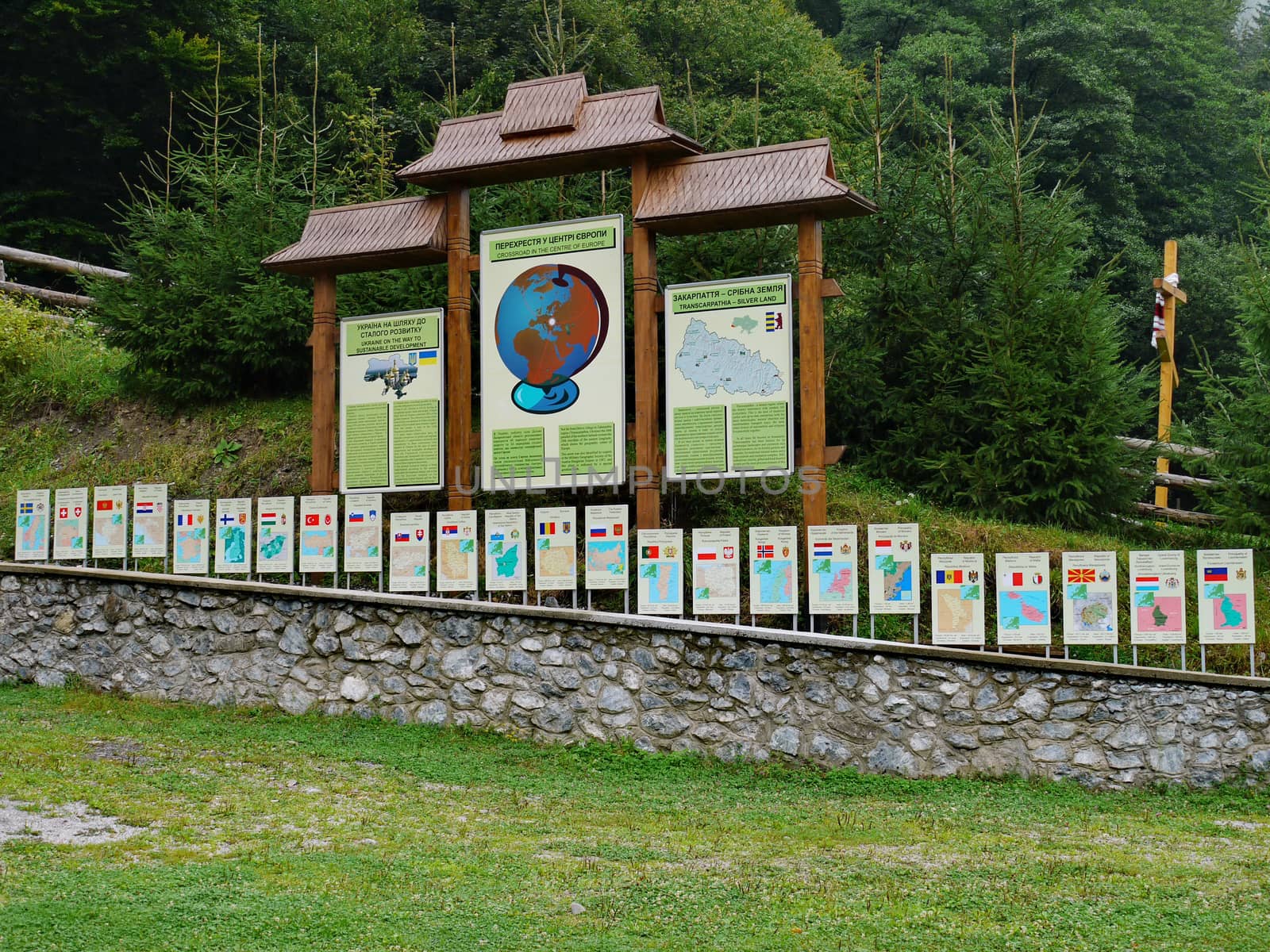 Information corner in the Carpathians with signs indicating important information for tourists