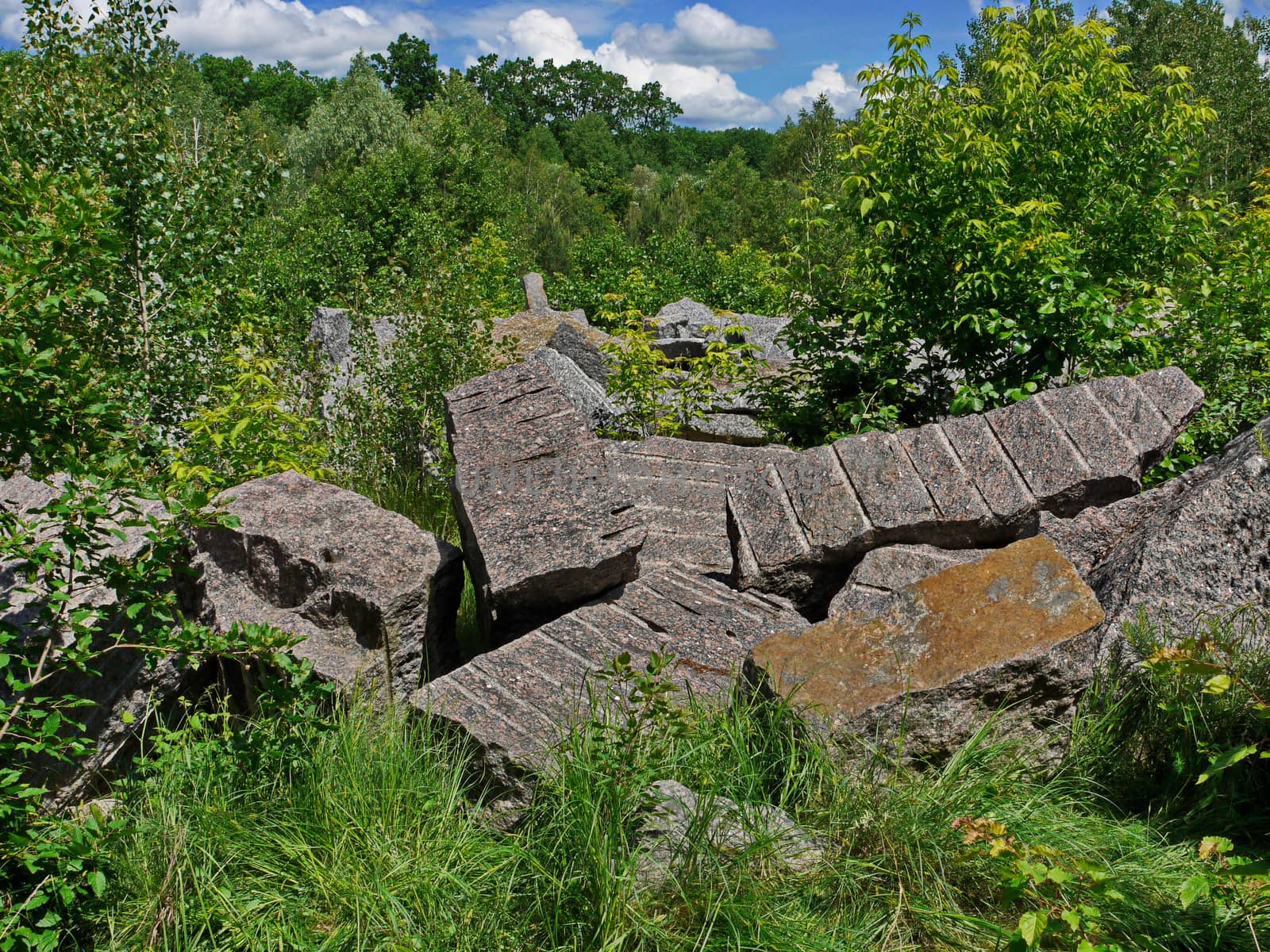 Dump of large fragments of stones from former pedestals of monuments