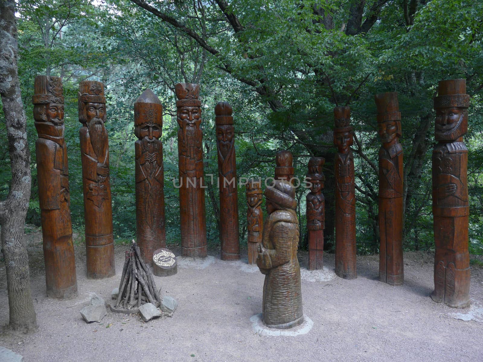 an exposition of wooden sculptures of twelve months and a girl who came to the forelimbs to the forest