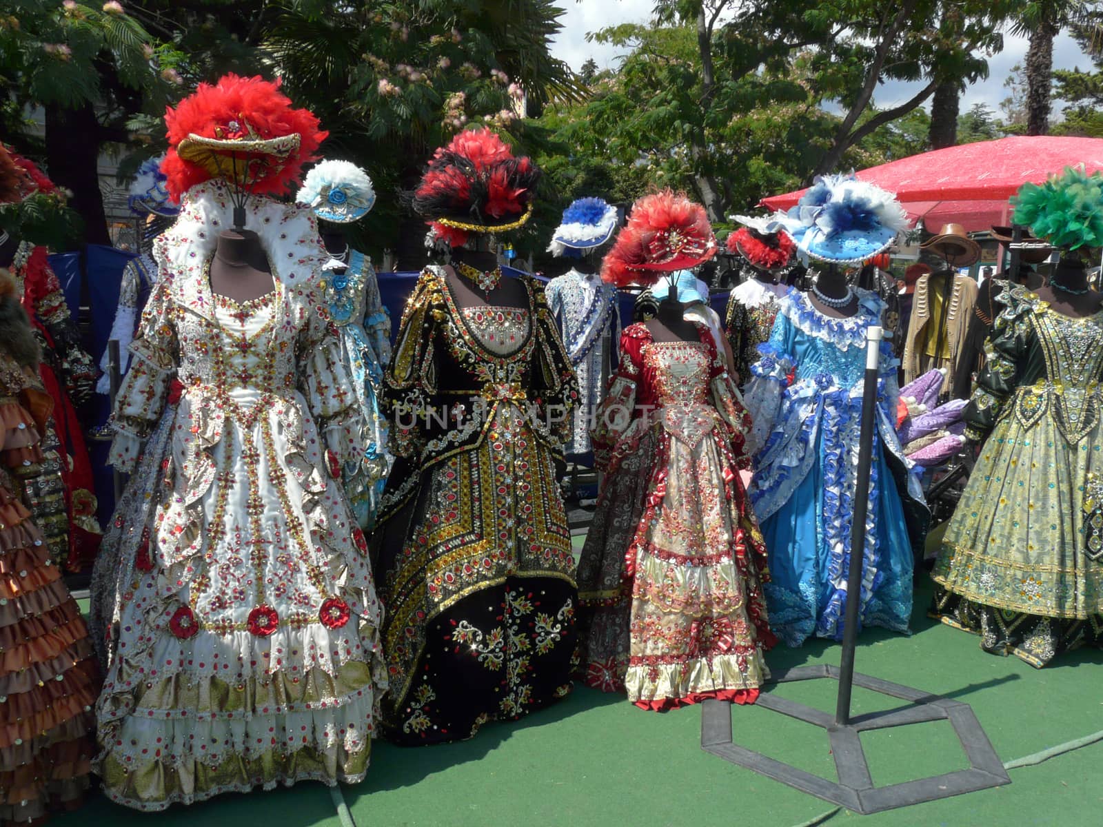 A huge selection of medieval costumes with beautiful ornaments and gorgeous hats