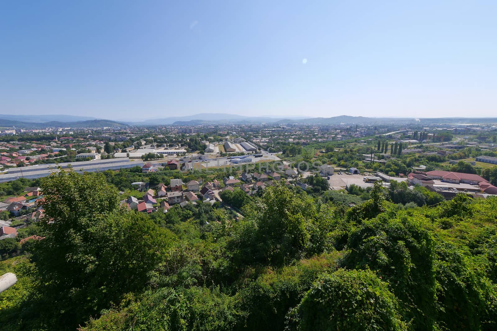 The panorama of the roofs of the city Mukachevo from the observation tower of the palanque castle