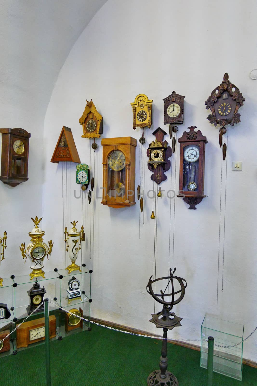 A lot of different and ancient wall clock with cuckoo, very beautiful thing for a vintage interior by Adamchuk