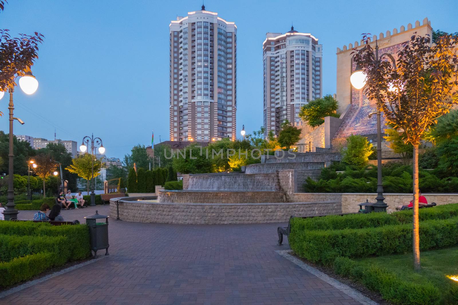 A large fountain-waterfall, behind which there is a wall with the image of a unique carpet Sheikh Safi pearls of Azerbaijani carpet weaving