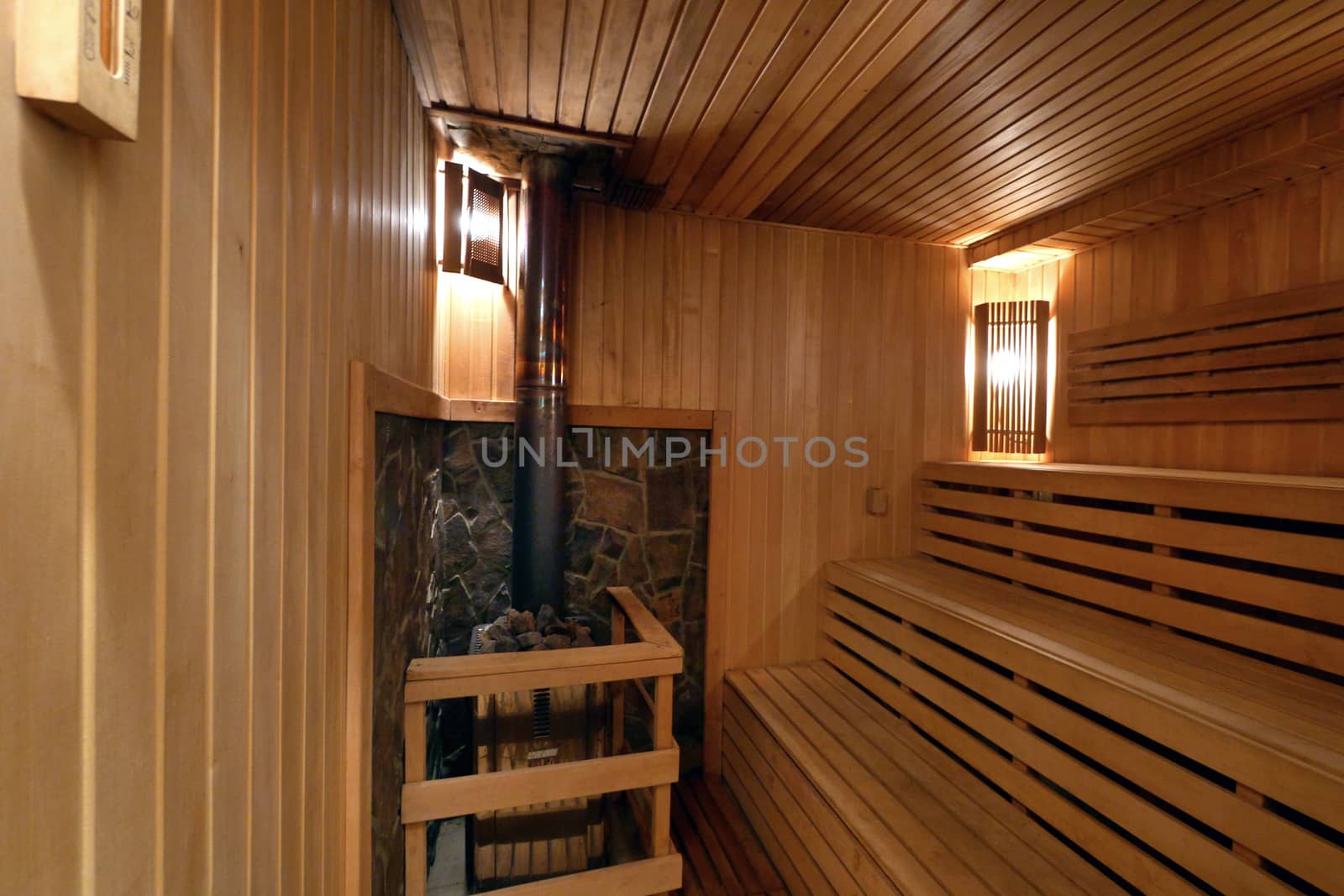 Finnish sauna with three wooden benches. Great place for relaxation