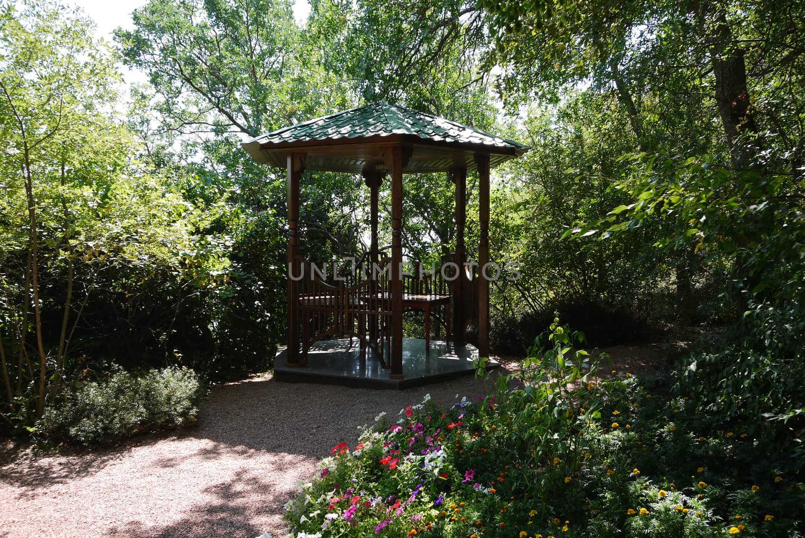 A tiny gazebo in the garden. You can sit and enjoy the scents in the air