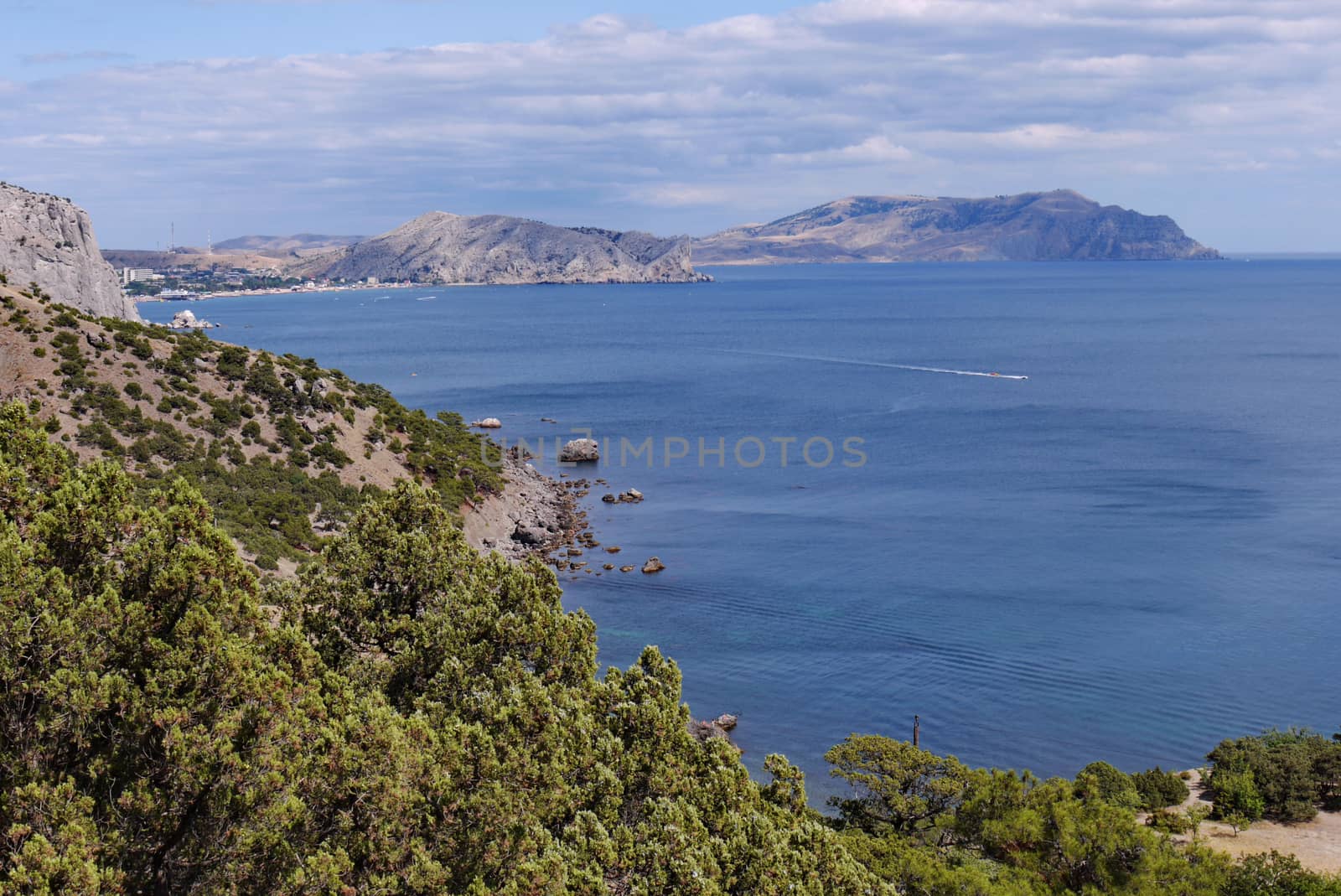 A delightful landscape on the sea bay located between the slopes of the mountains