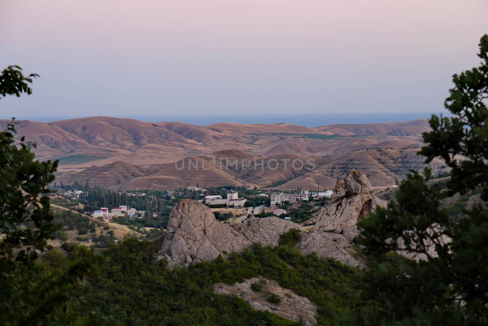 The village is surrounded by beautiful mountains in the background of the boundless sea