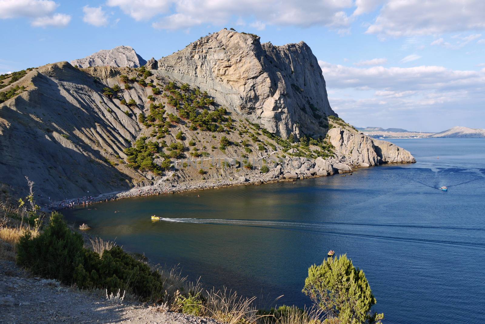 the bay of the black sea against the background of the Crimean mountains. Walking on a boat