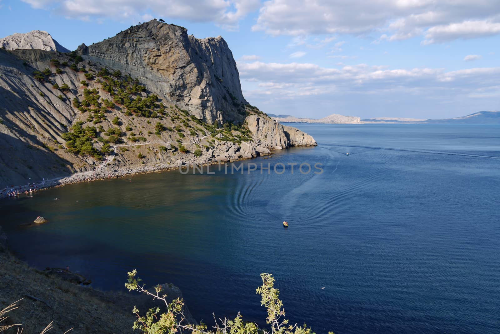 the bay of the black sea against the background of the Crimean mountains. Walking on a boat