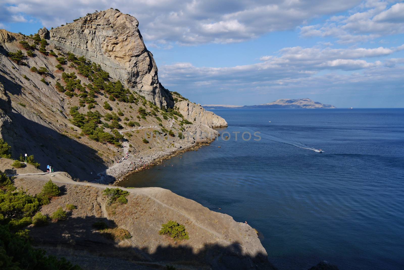 the bay of the black sea against the background of the Crimean mountains. Walking on a boat