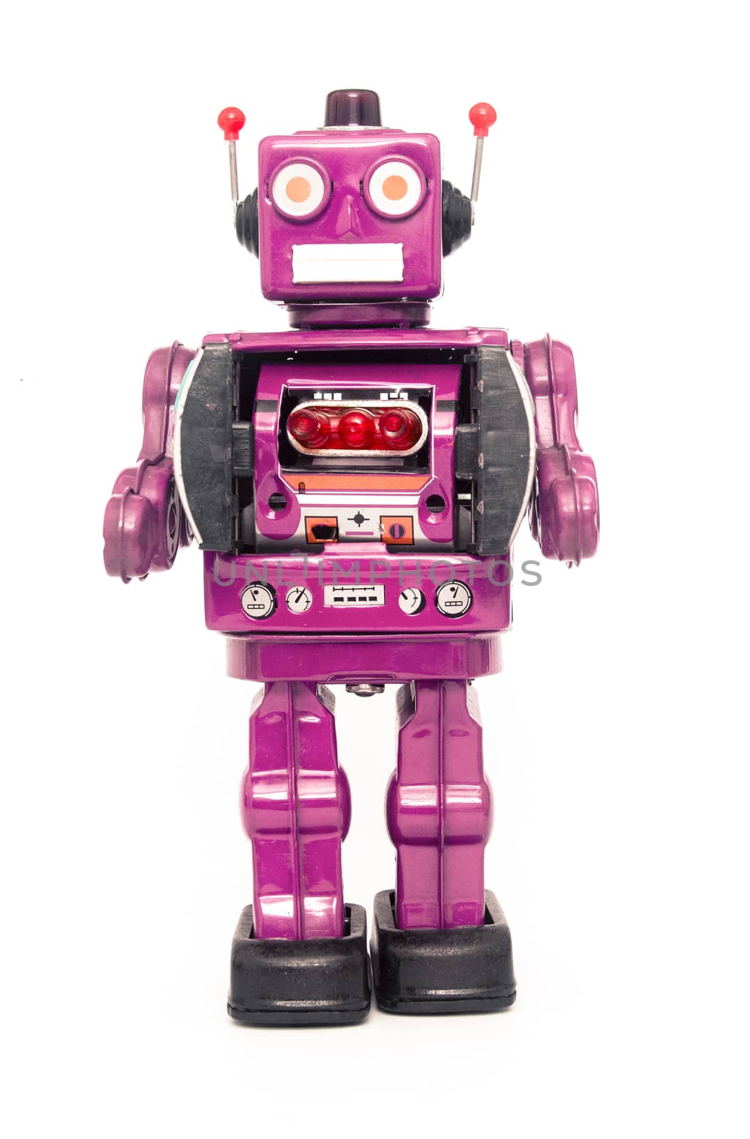 A large metalic robot toy standing 