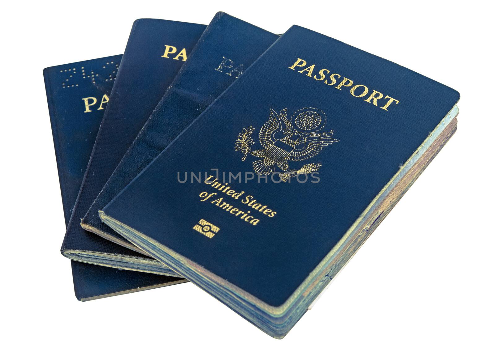 a colection of old used passports 