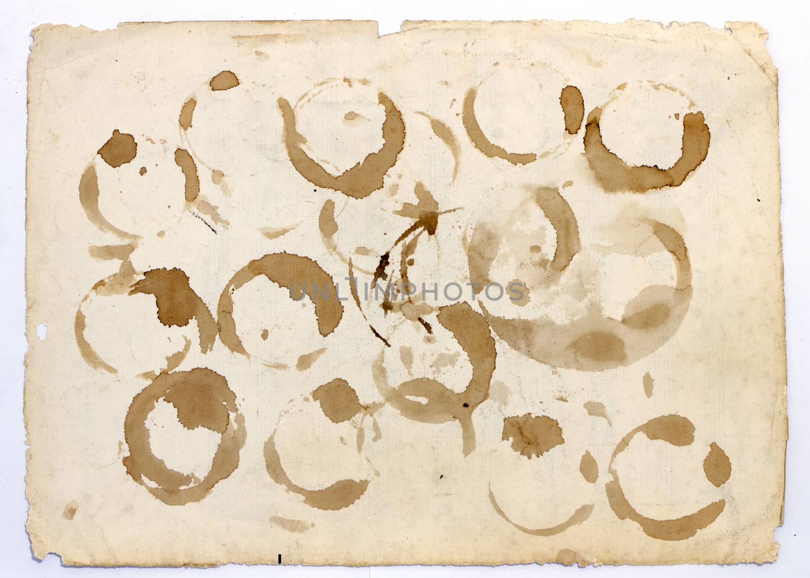 old paper with coffee rings on it 