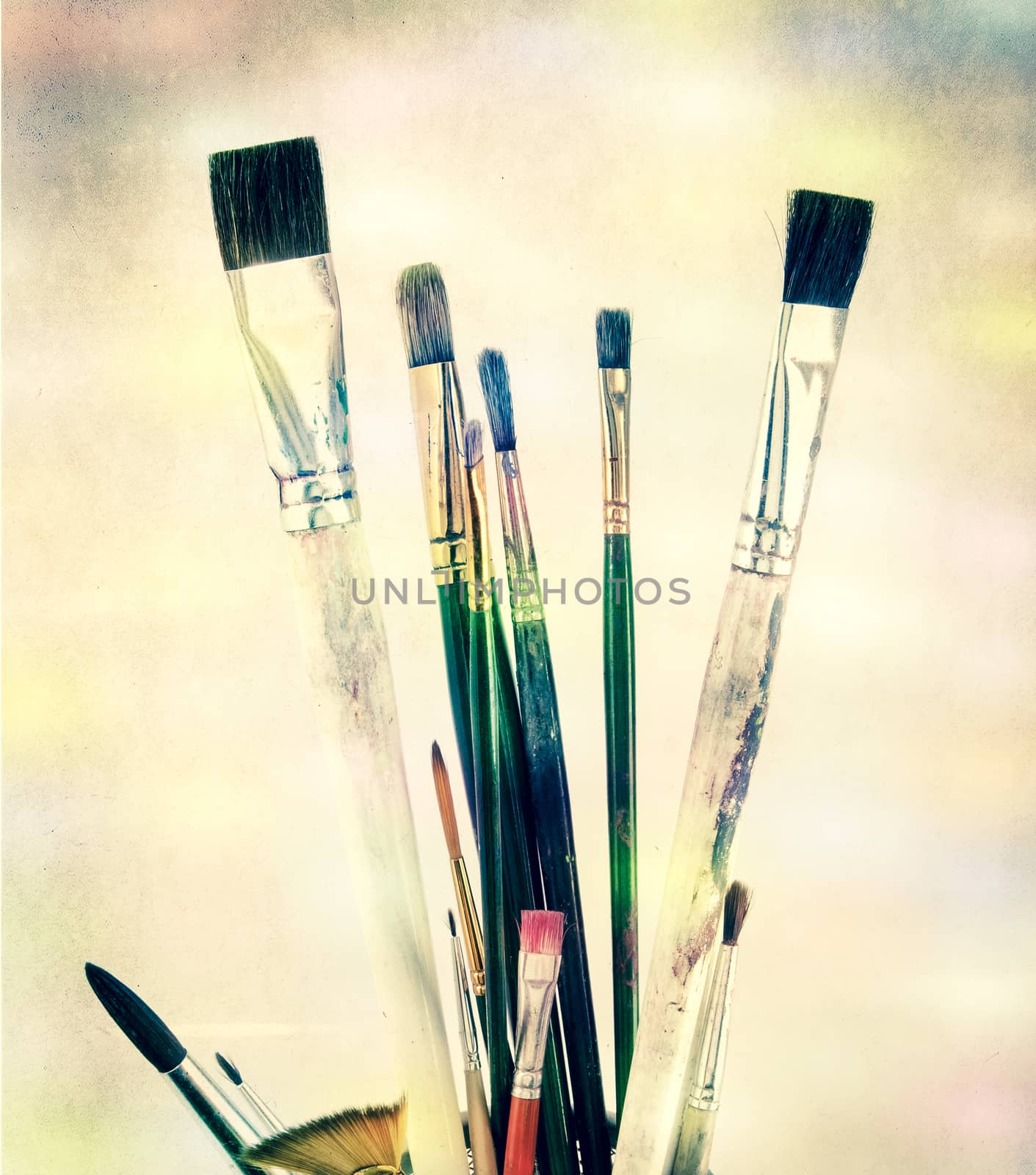 a colection of paint brushes