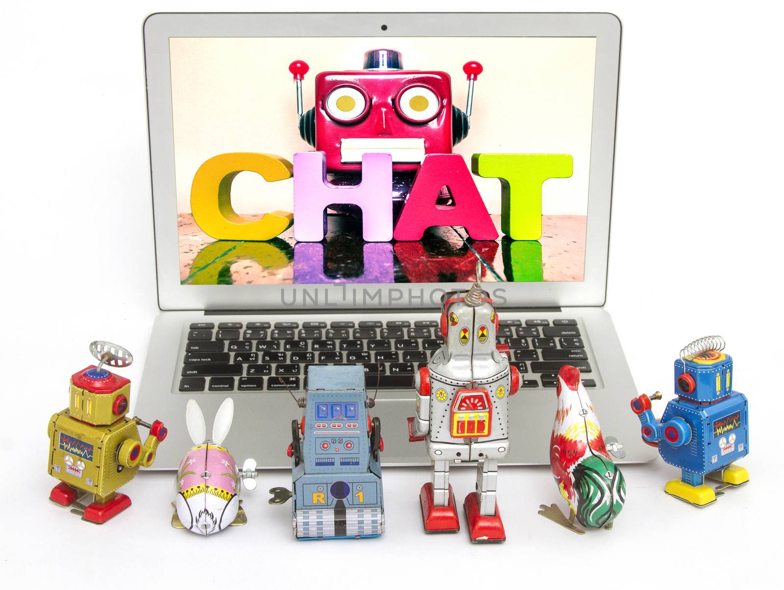 robot kids learn about  Chat Bots  on a laptop