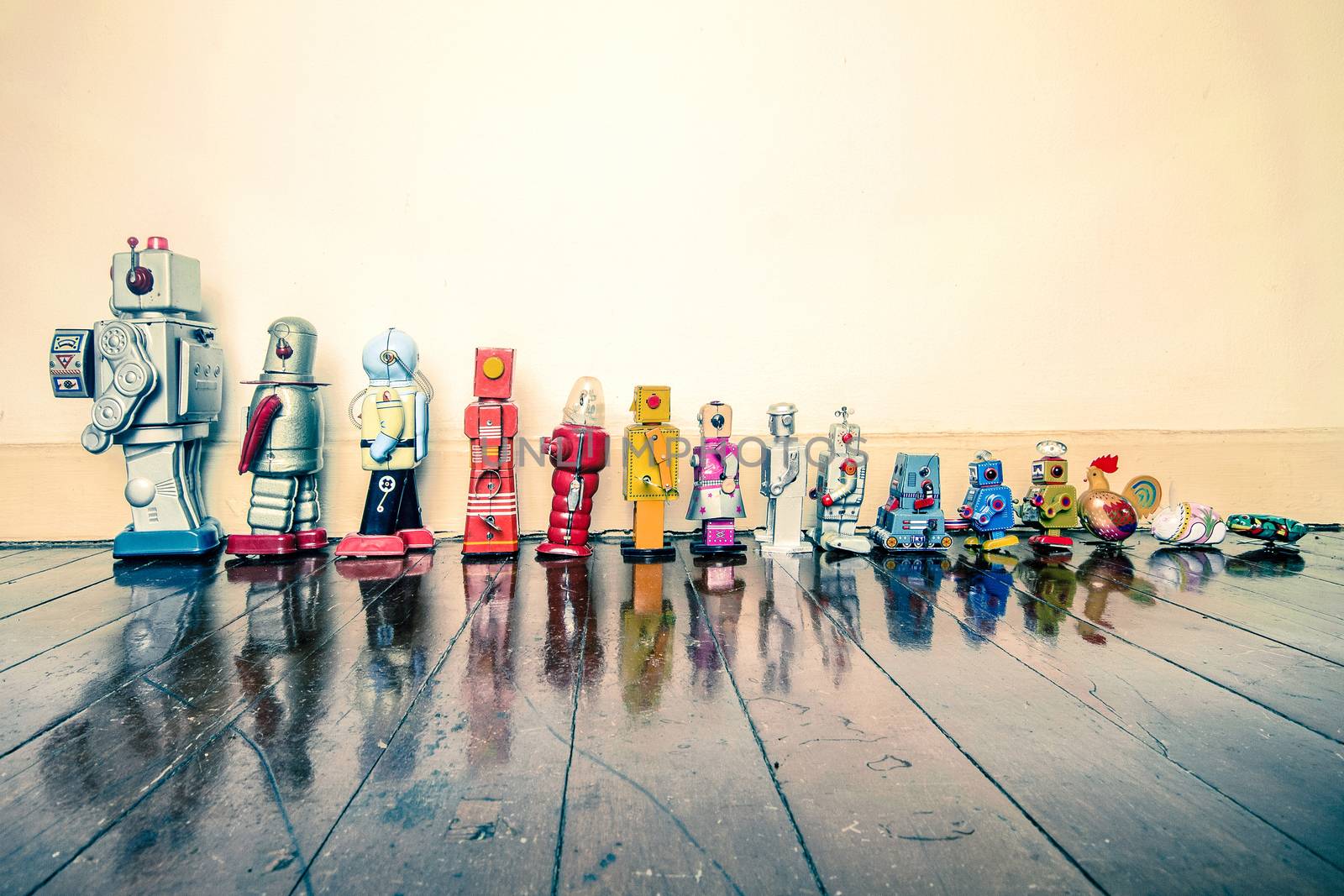 a line of vintage robots from small to big 