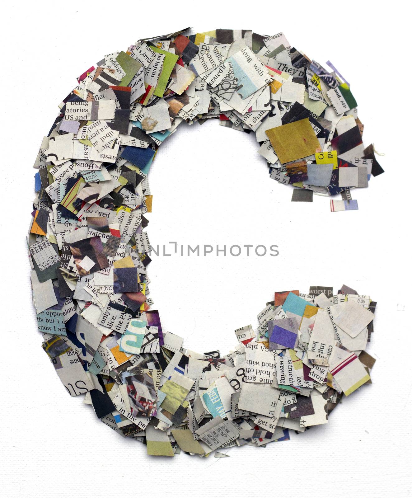 Letters made from newspaper capitel C isolated on white 