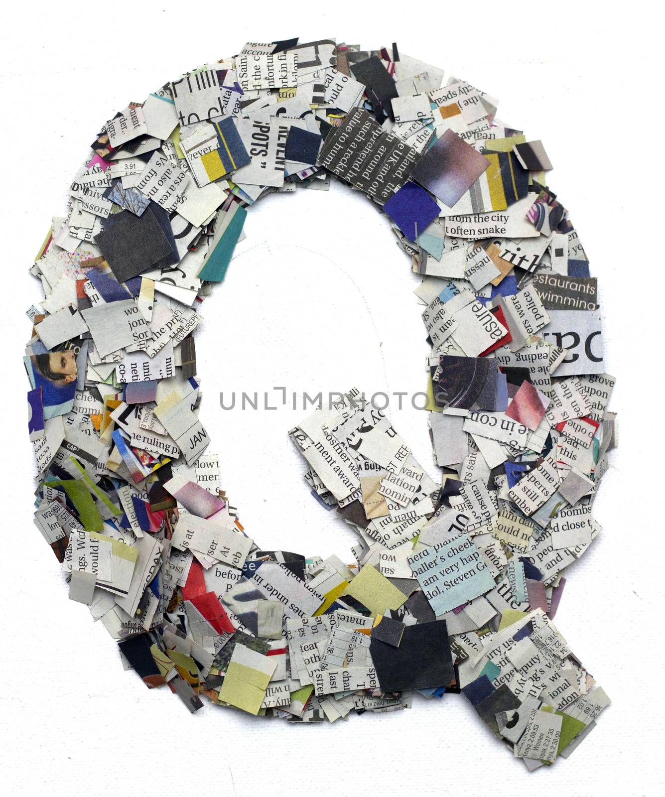 Letters made from newspaper capitel Q by davincidig