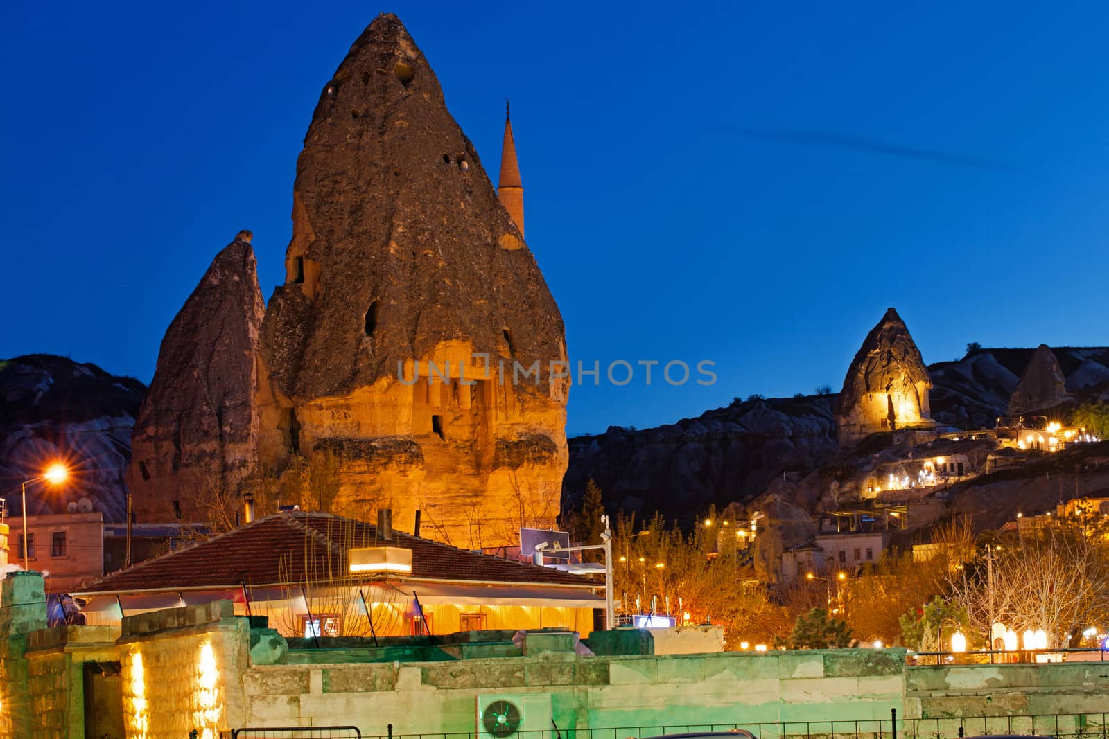 Cylindrical stone cliffs and cave houses in Goreme, Turkey